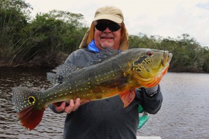 Mark with his spotted peacock bass.