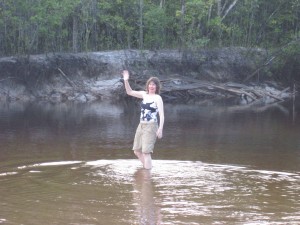 A dip about to take a dip in the river.