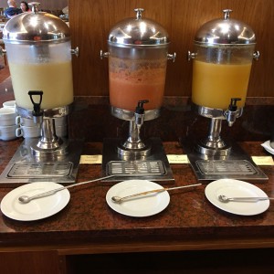 Three types of juice in the motel: cactus, mango and orange.